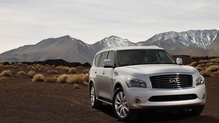 2011 Infiniti QX56 Front Pose In White Near Hills